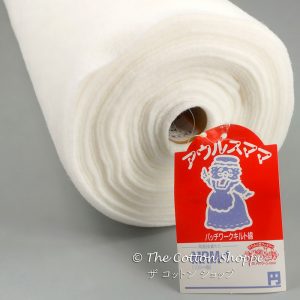 Double-sided fusible batting